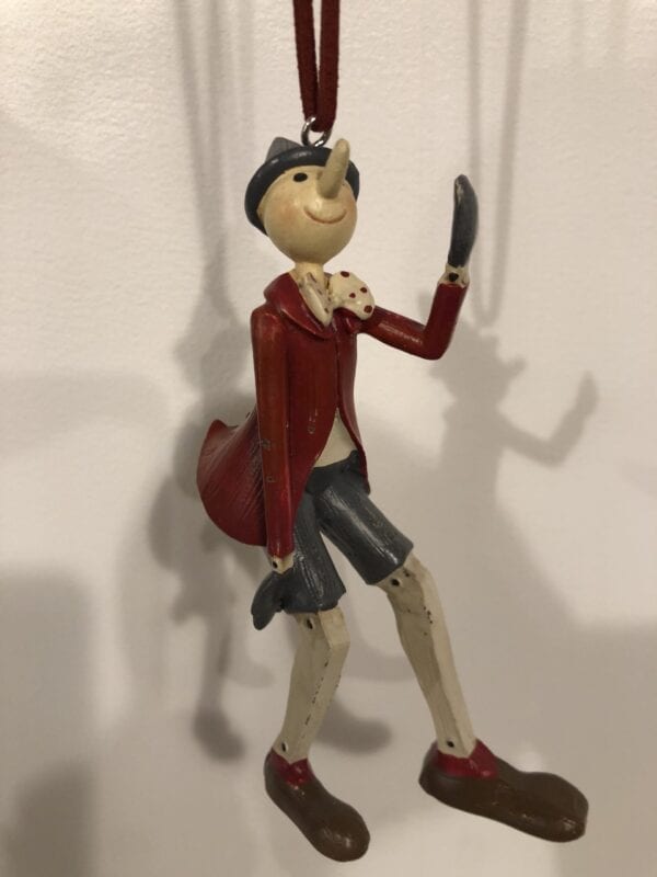 Piccolo pendente con Pinocchio che cammina