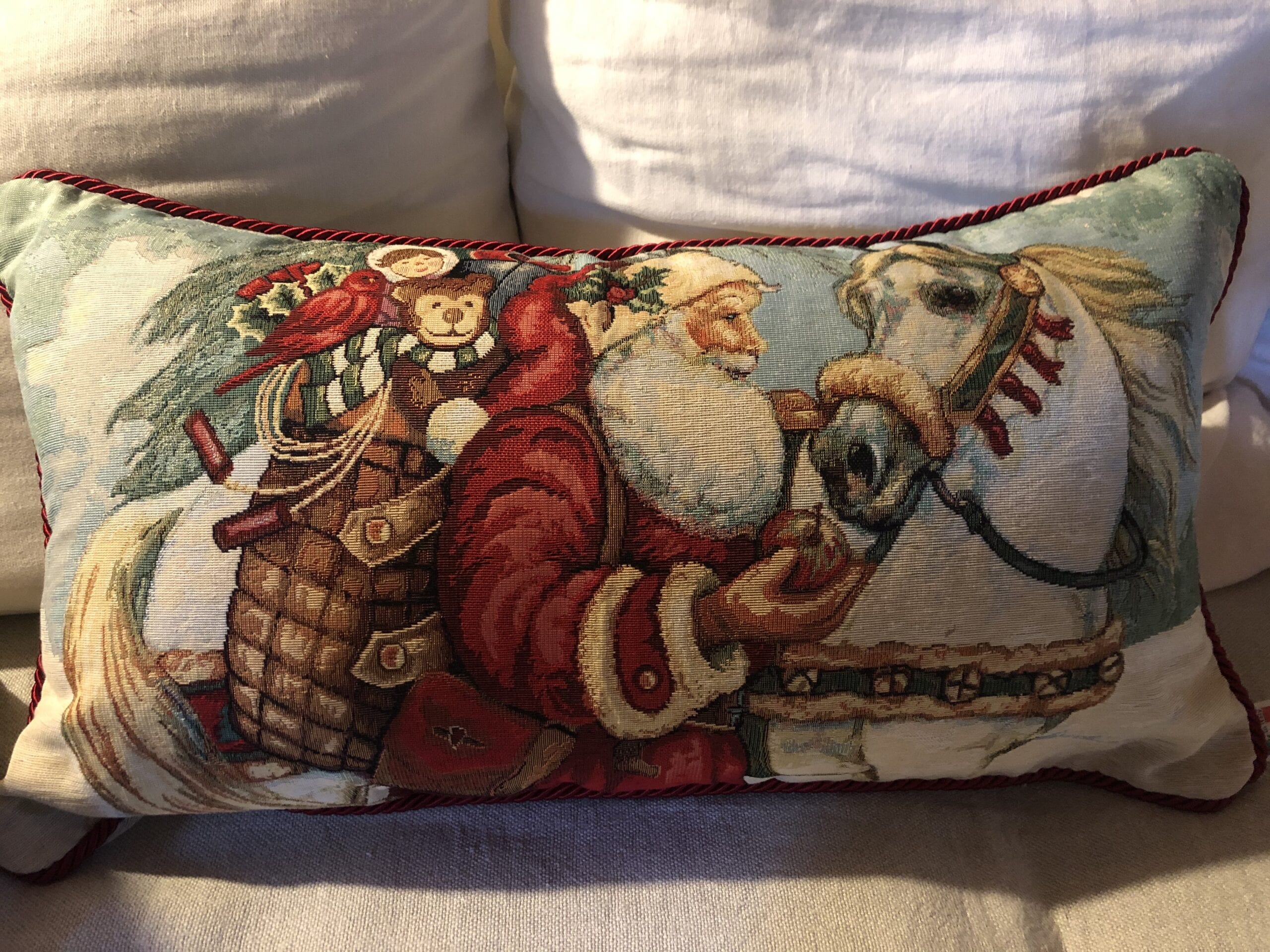 Cuscino rett. orizzontale con cordone – Babbo Natale con cavallo