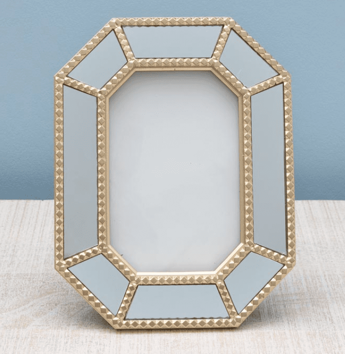 Cornice ottagonale oro e specchi
